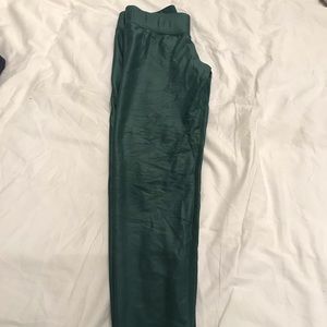 Shiny green leggings.  Metallic look.